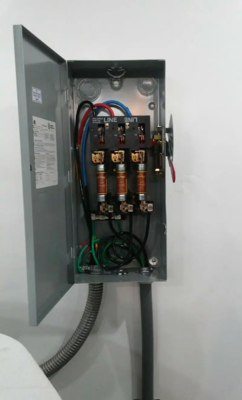 Three-phase disconnect switch installed for Smoke Detector Installation in Valencia West